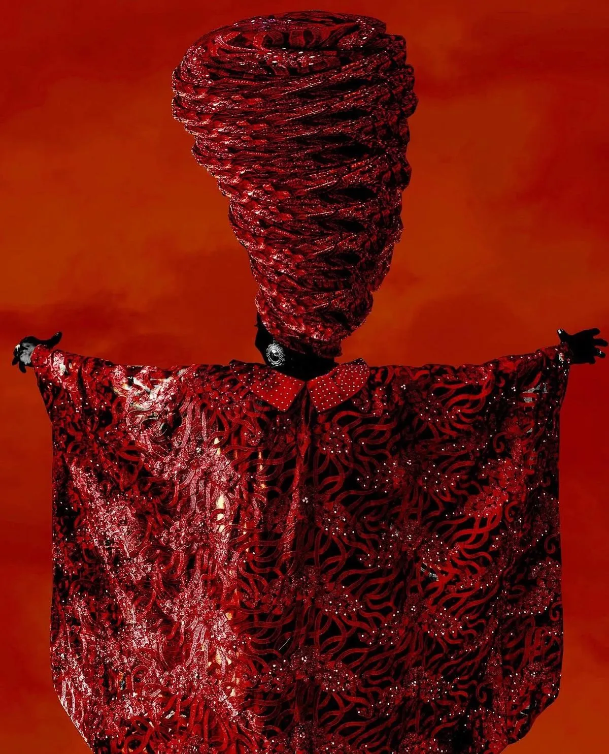 Red sculptural portrait, artwork by Sanjo Lawal